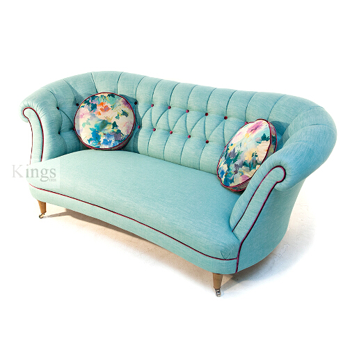 John Sankey Evita Button Back Sofa in Vintage Linen Aqua Fabric with Circular Cushions in Floral Fabric