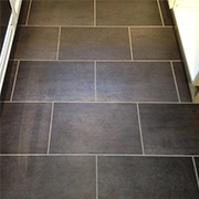 Slate Effect Luxury Vinyl Tile and Grout Strip Fully Screeded and Fitted to a Kitchen