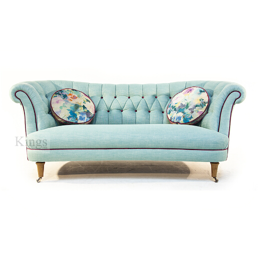 John Sankey Evita Button Back Sofa in Vintage Linen Aqua Fabric with Circular Cushions in Floral Fabric