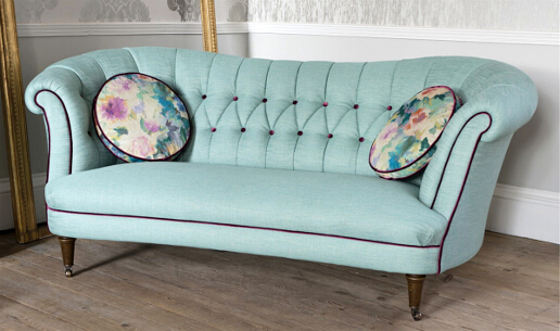 John Sankey Evita Grand Sofa in Vintage Linen Aqua Fabric with Circular Cushions in Floral Fabric