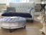 John Sankey Holkham Sofa in Milligan Silver and Du Barry Velvet Iris with Boothby Round Ottoman in Ibsen Velvet Violet Grey