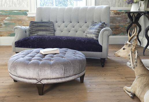 John Sankey Holkham Sofa in Milligan Silver and Du Barry Velvet Iris with Boothby Round Ottoman in Ibsen Velvet Violet Grey