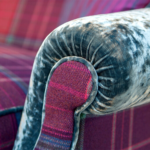 John Sankey Tosca Snuggler in Cello Raspberry Wool Fabric with Velvet Arms Detail