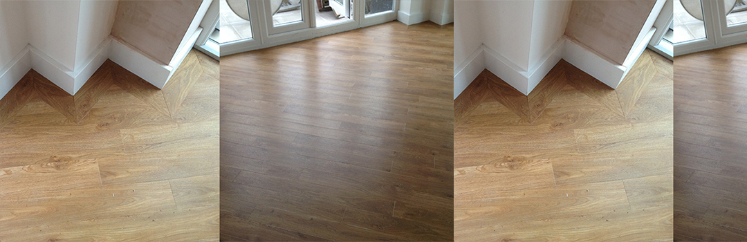 Luxury Vinyl Tiles Screeded and Fully Fitted to a Large Living Room with An External Border
