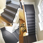 A beautifully fitted 100% wool loop pile carpet to a stairs and landing carpet fitted by James