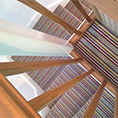 Oak Staircase With Multi Striped Carpet